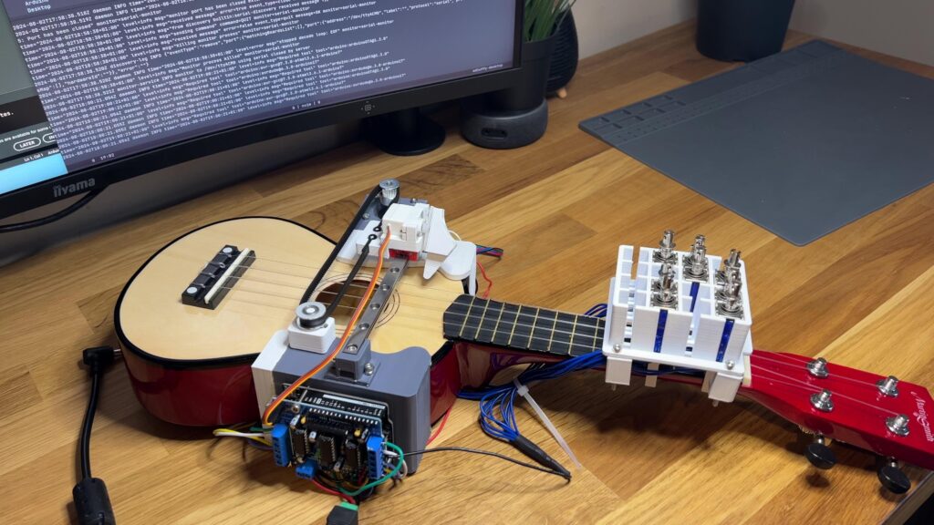 An Arduino-powered robotic ukulele that plays itself