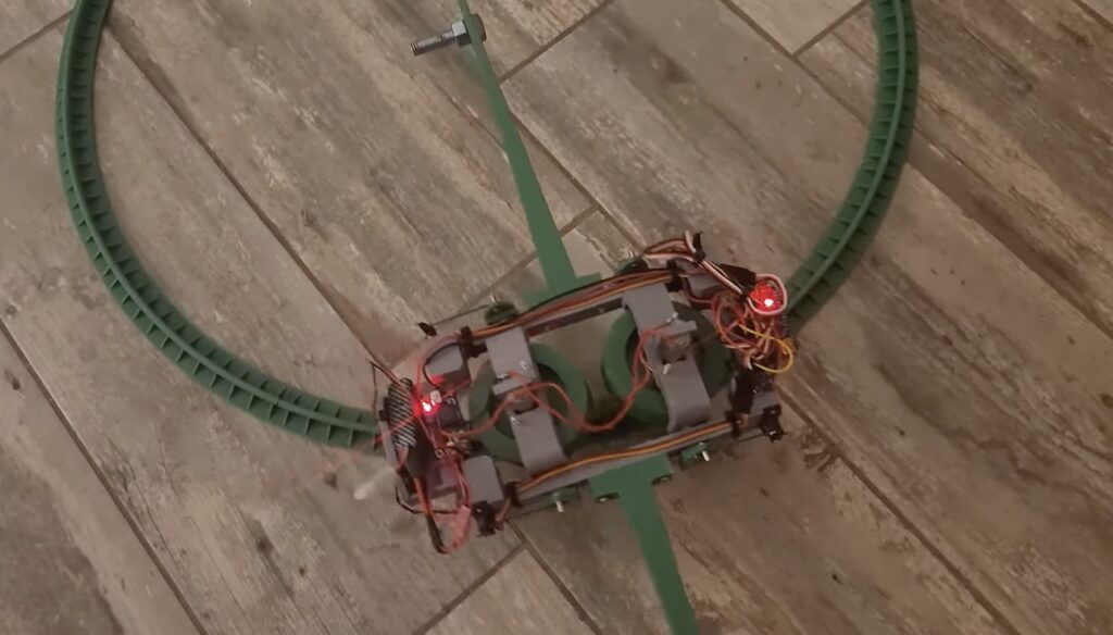 This miniature monorail stays upright with the help of gyro stabilization