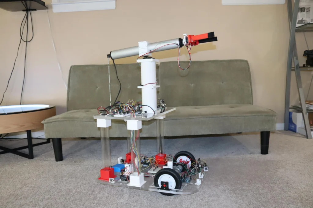 This trash-handling robot contains a whopping 11 Arduino boards